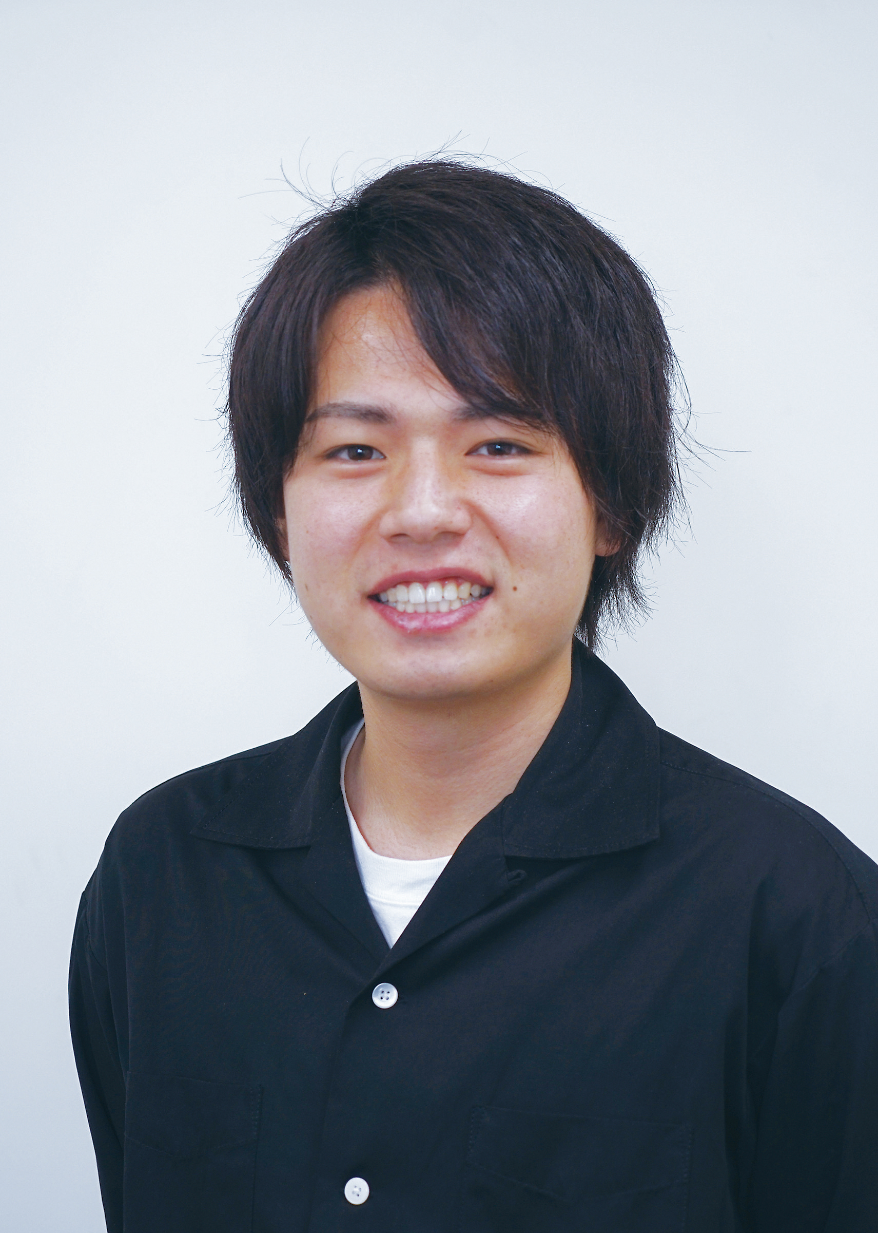 横田 拓也
